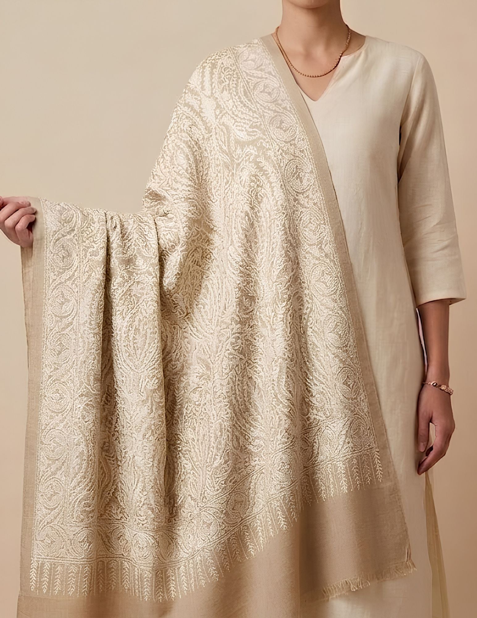 Ivory Sozni stole worn over one shoulder.