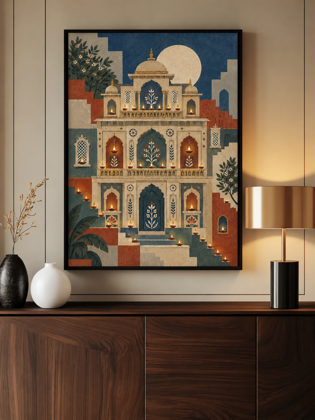 Deepmala Indo-Bauhaus painting shown in a black frame above a walnut sideboard beside a brass table lamp