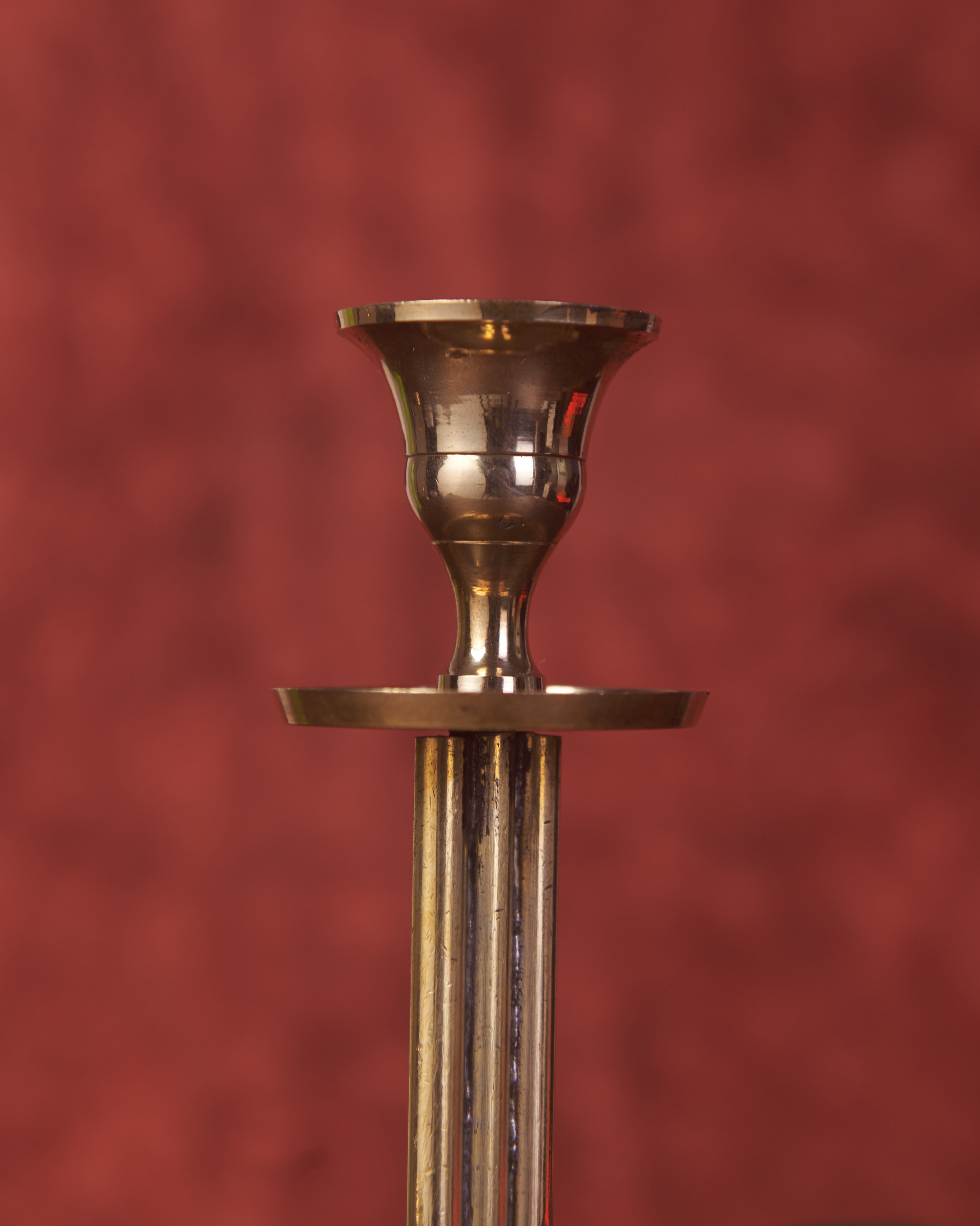 Brass three arm candelabra glowing candlelight classic vintage style living room decor