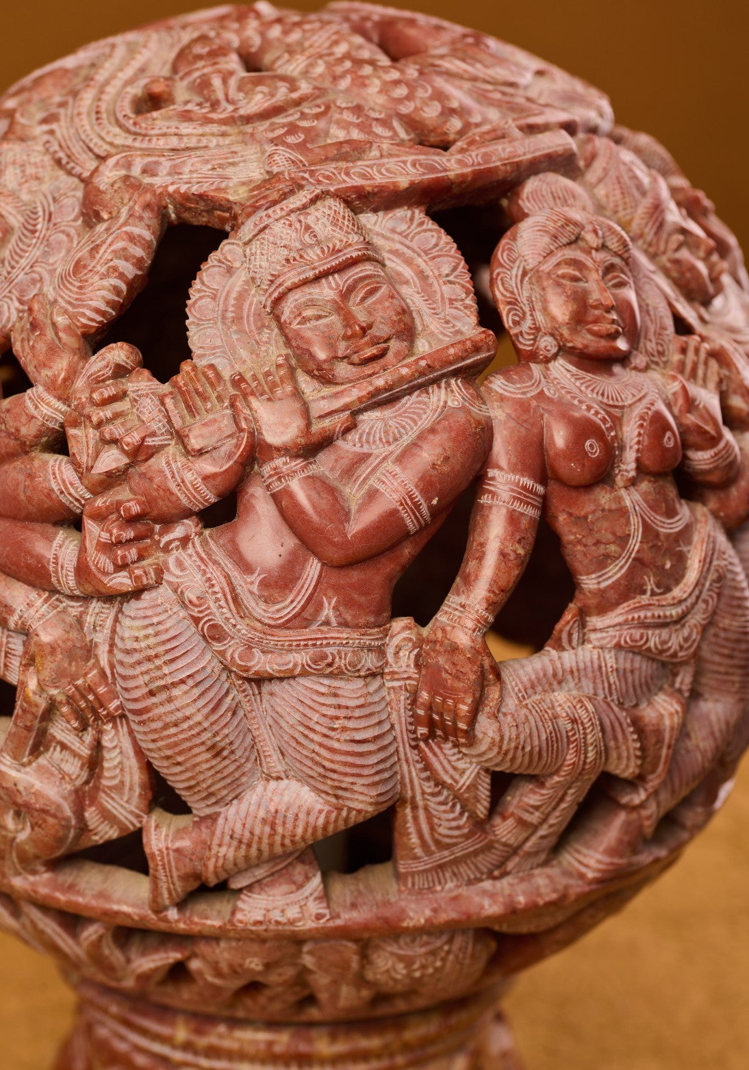 Hand-carved red stone lamp details – Indian home décor craftsmanship