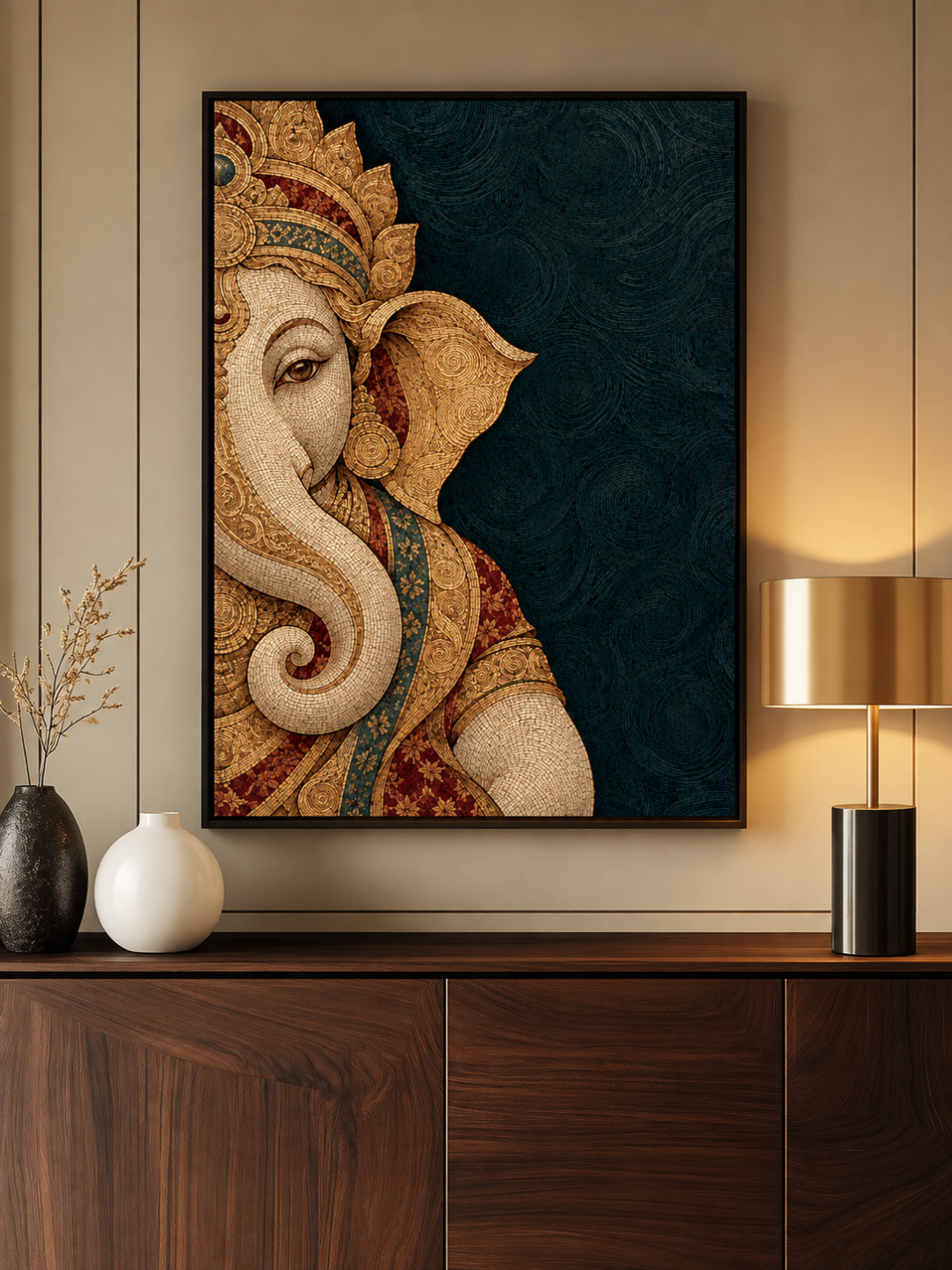 Ganesha in Gold and Shadow art print shown framed above a walnut sideboard with vases and a brass lamp