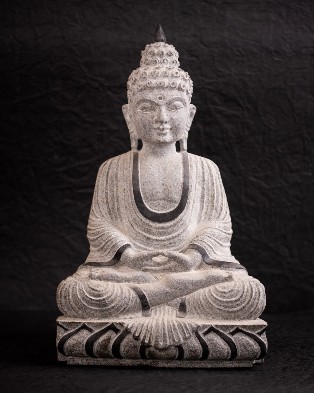 Meditating Buddha Statue in the Lotus Pose