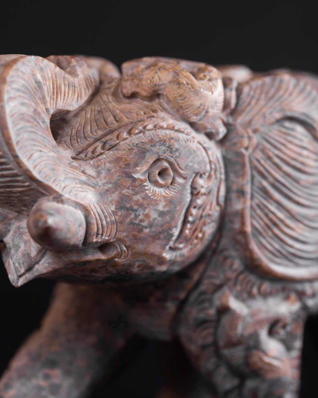 Vintage‑style marble elephant sculpture with detailed engraving