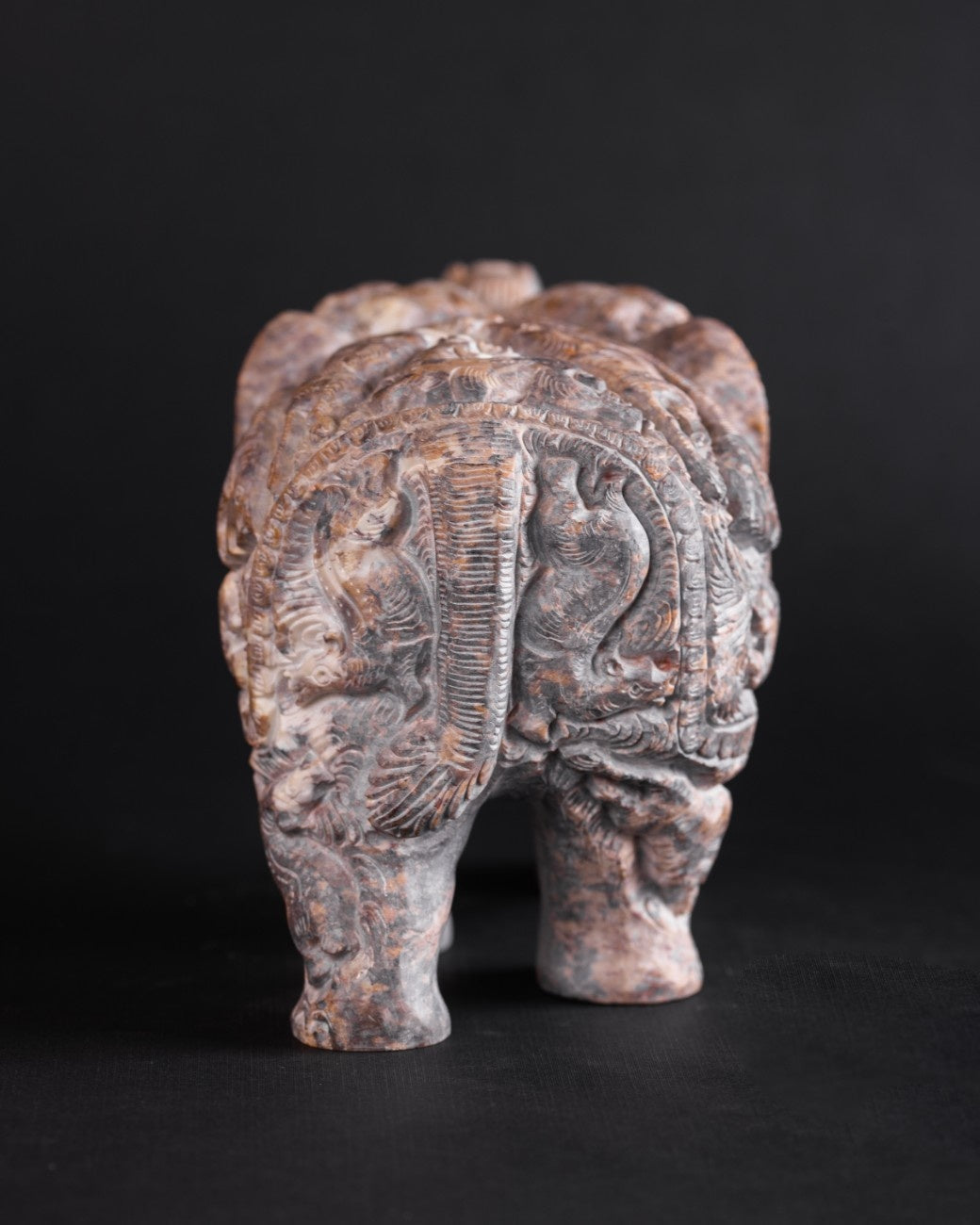 Solid marble elephant symbol of good fortune, engraved surface