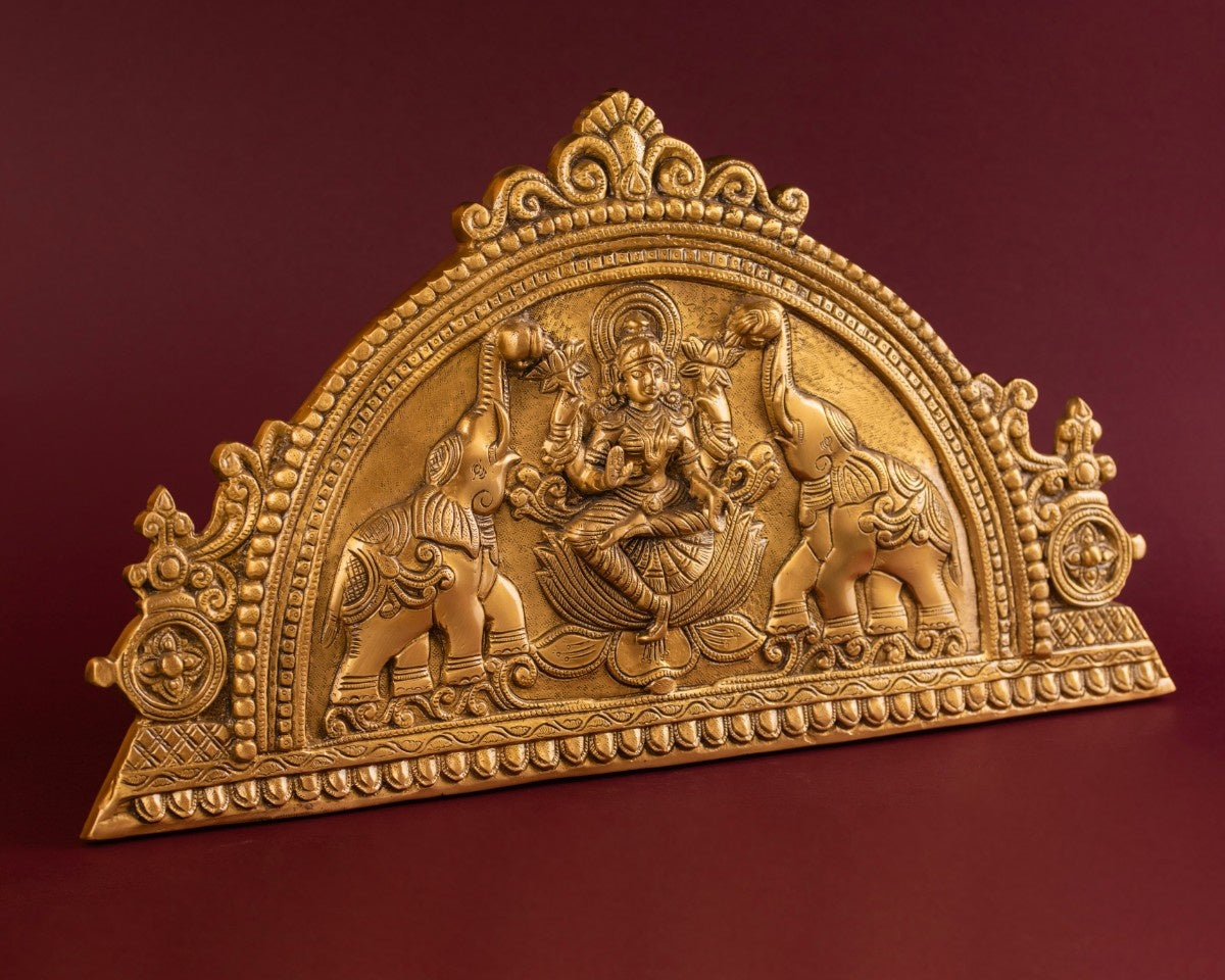 brass plaque of Lakshmi with elephants