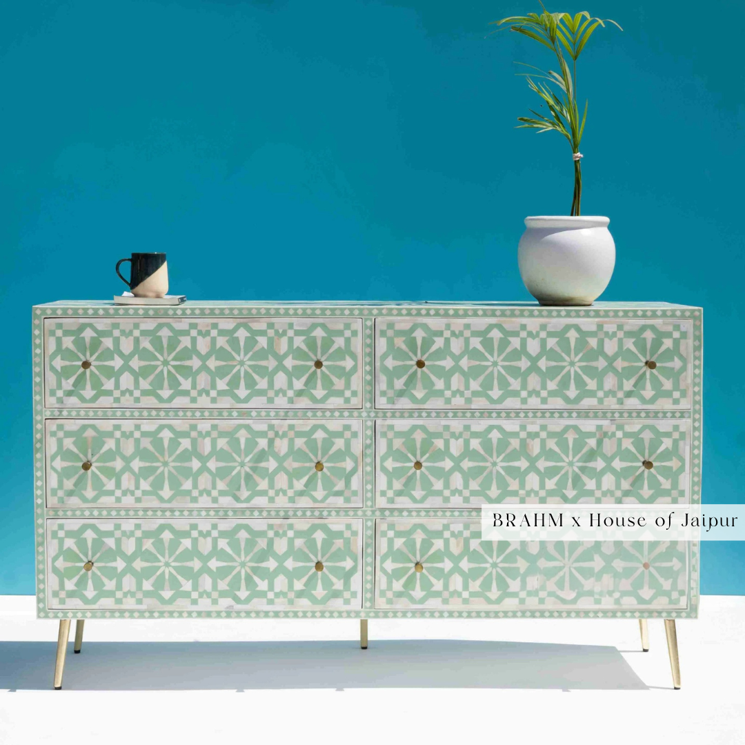 Front view of green and white bone inlay six-drawer dresser.