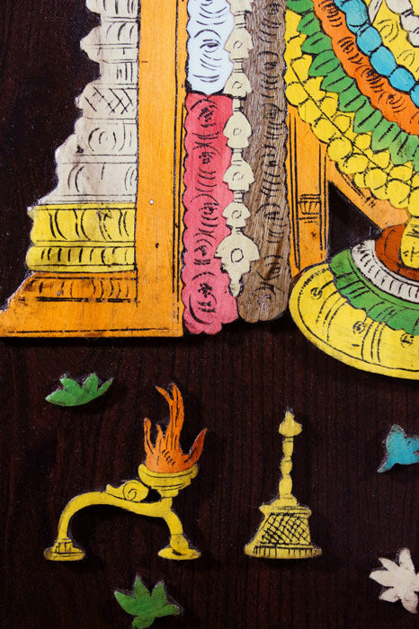 Close-up detail of a Mysore rosewood inlay artwork showing layered three-dimensional carving and fine inlay work depicting Lord Venkateshwara, highlighting traditional woods, composite materials, and precise hand craftsmanship from Mysuru.