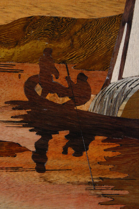 Close-up of Mysore rosewood inlay detailing showing handcrafted boat scene and natural wood grain