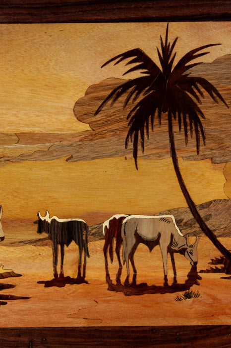 Close-up of Mysore rosewood inlay artwork showing intricate handcrafted details of rural farming figures and natural wood inlay craftsmanship