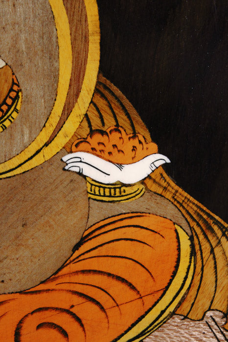 Close-up of intricate Mysore rosewood inlay detailing on a Ganesha wall panel, highlighting fine hand-cut wood inlay, flowing contours, layered textures, and traditional craftsmanship.