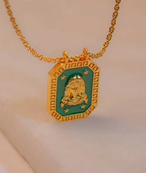 Gold Virgo zodiac tablet necklace with green enamel front and maiden motif