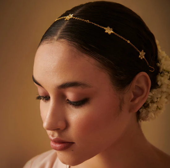 Model wearing Phool Sitara mirror polki matha patti, elegant Indian bridal hairstyle accessory
