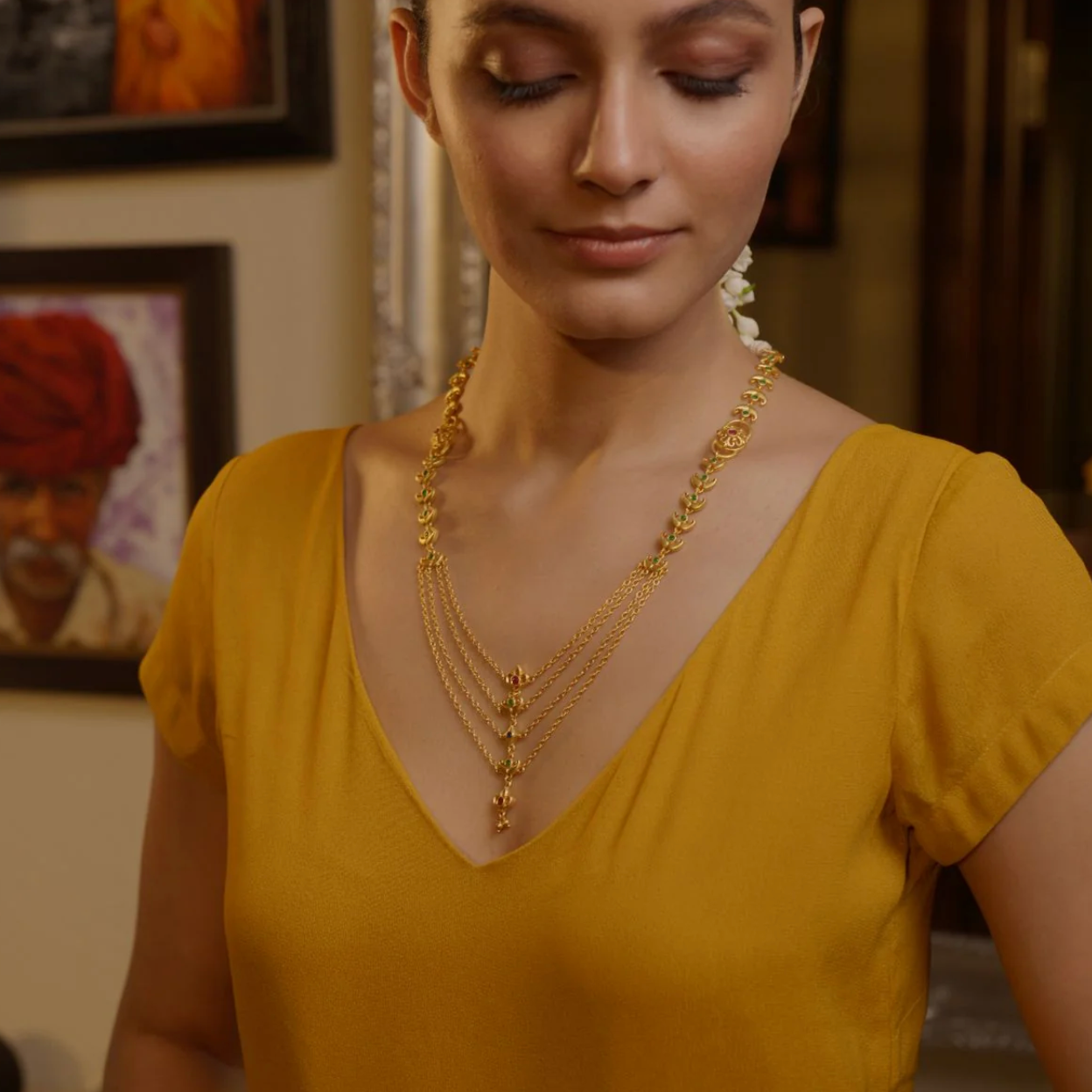 gold-plated multi-layer traditional necklace styled on model, regal ethnic jewelry for women, ideal for festive and wedding outfits