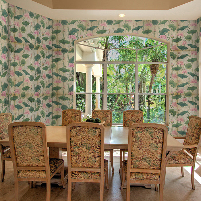Dining room with floral wallpaper and a large window overlooking greenery