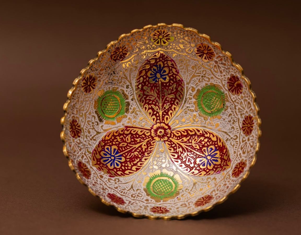 Set of four handcrafted brass fruit bowls with royal enamel detailing