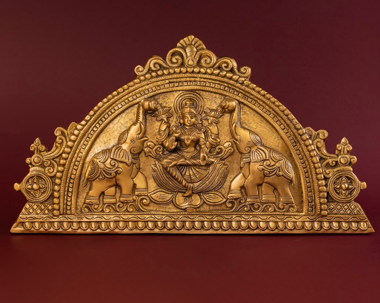 brass plaque of Lakshmi with elephants