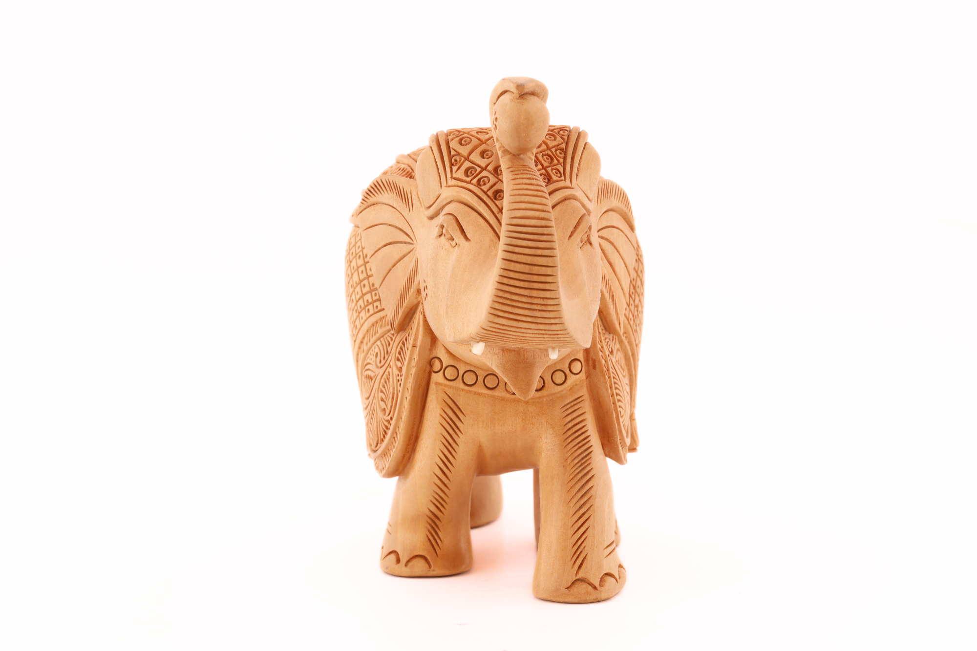 Traditional wooden elephant sculpture reflecting artisanal carving and cultural symbolism for home styling