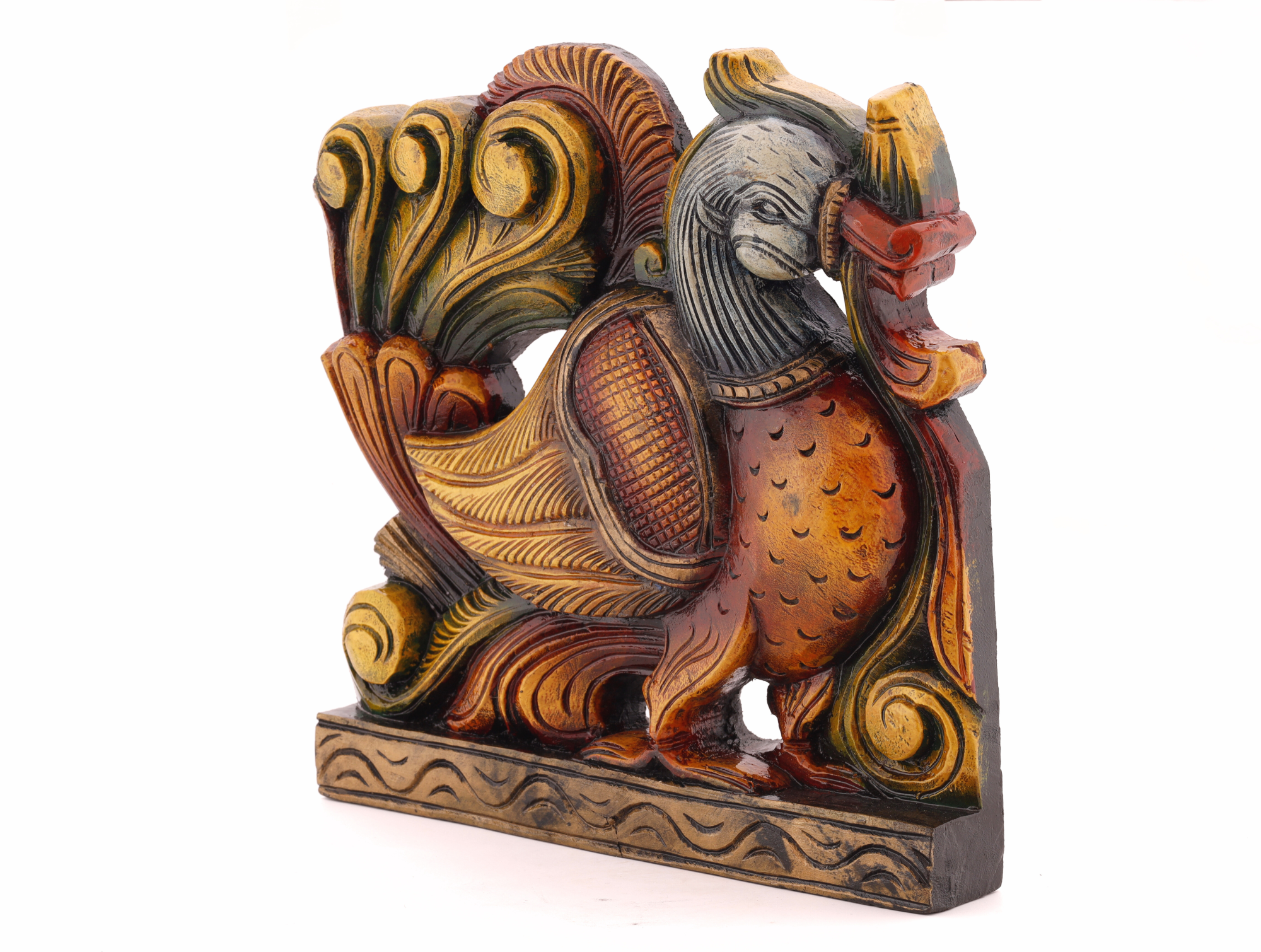 Carved wooden peacock art piece showcasing flowing form and artisanal craftsmanship for statement interiors