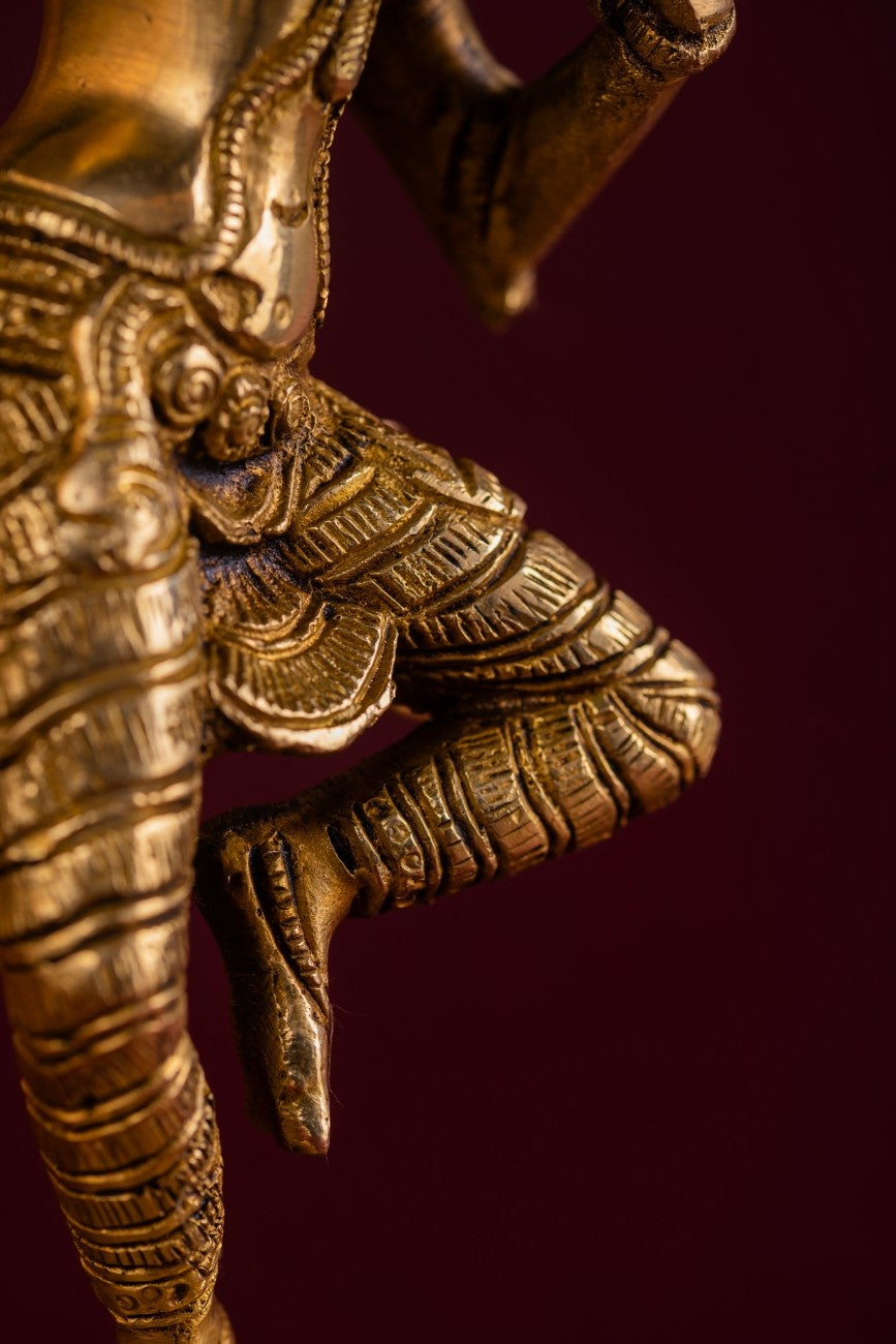 Detailed base and flowing garments on brass dancing lady with mirror – artisan Indian brass sculpture