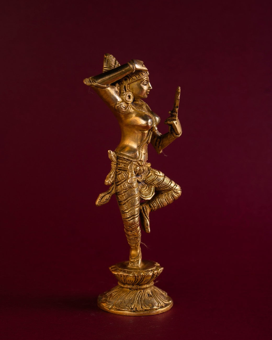 Detailed base and flowing garments on brass dancing lady with mirror – artisan brass sculpture