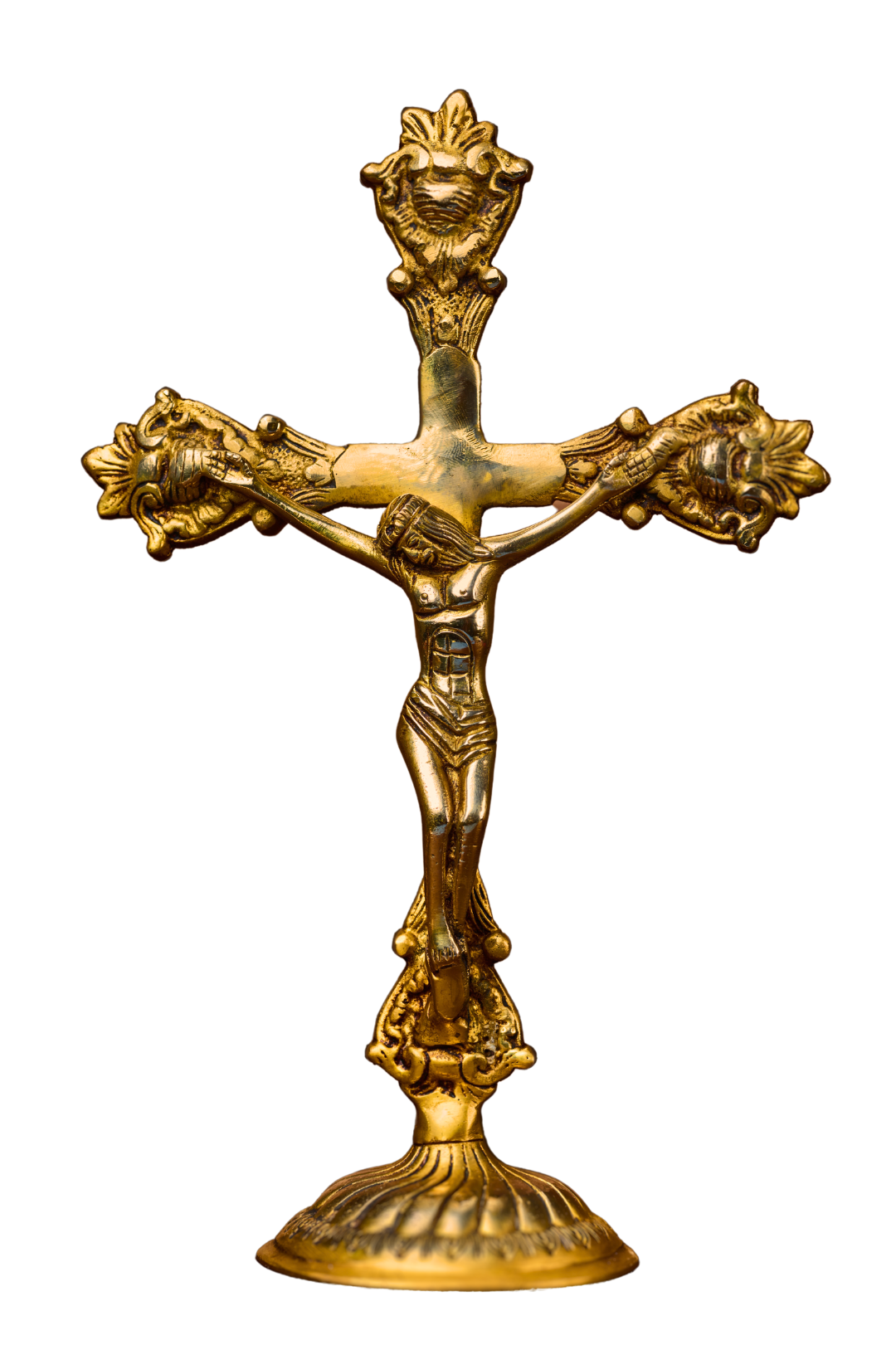 Standing brass crucifix with sculpted Christ figure and engraved cross patterns, traditional Christian altar piece.