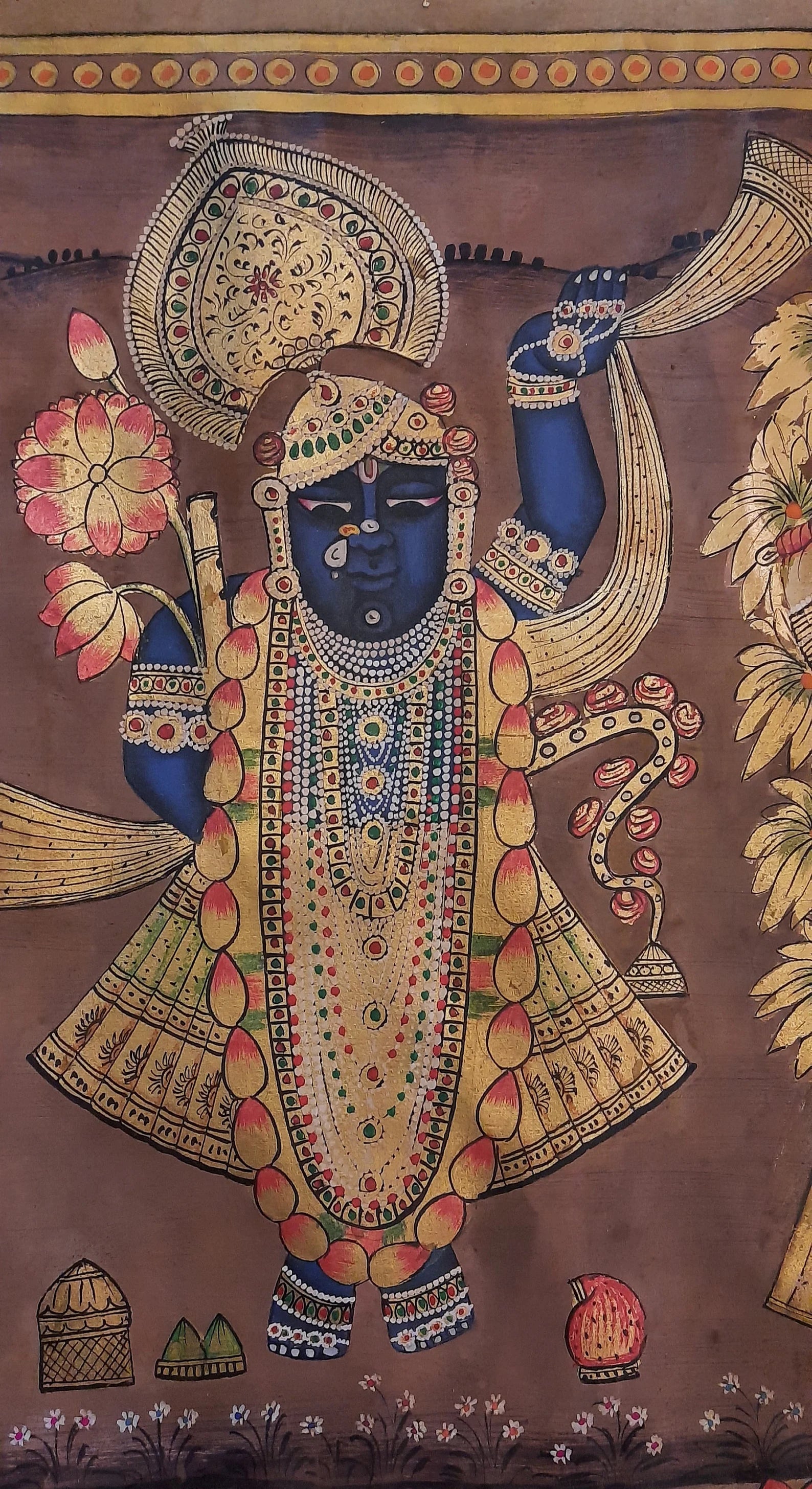 Detailed Golden Pichwai painting focusing on Lord Shrinathji with ornate gold accents