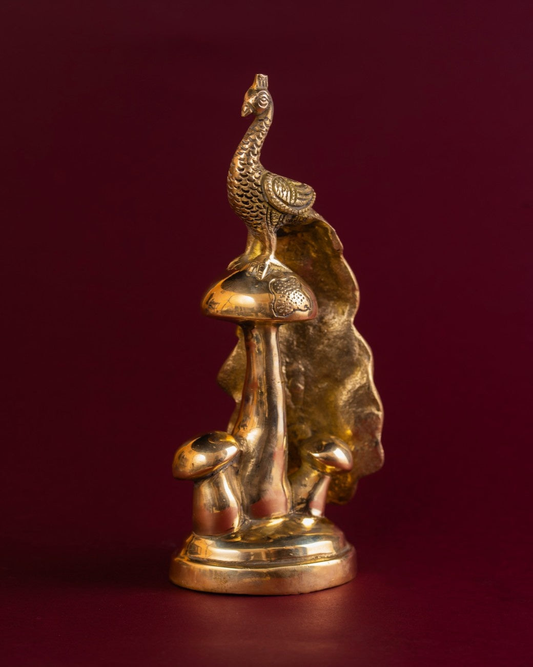 Close-up of brass peacock sculpture – detailed Indian brass statue