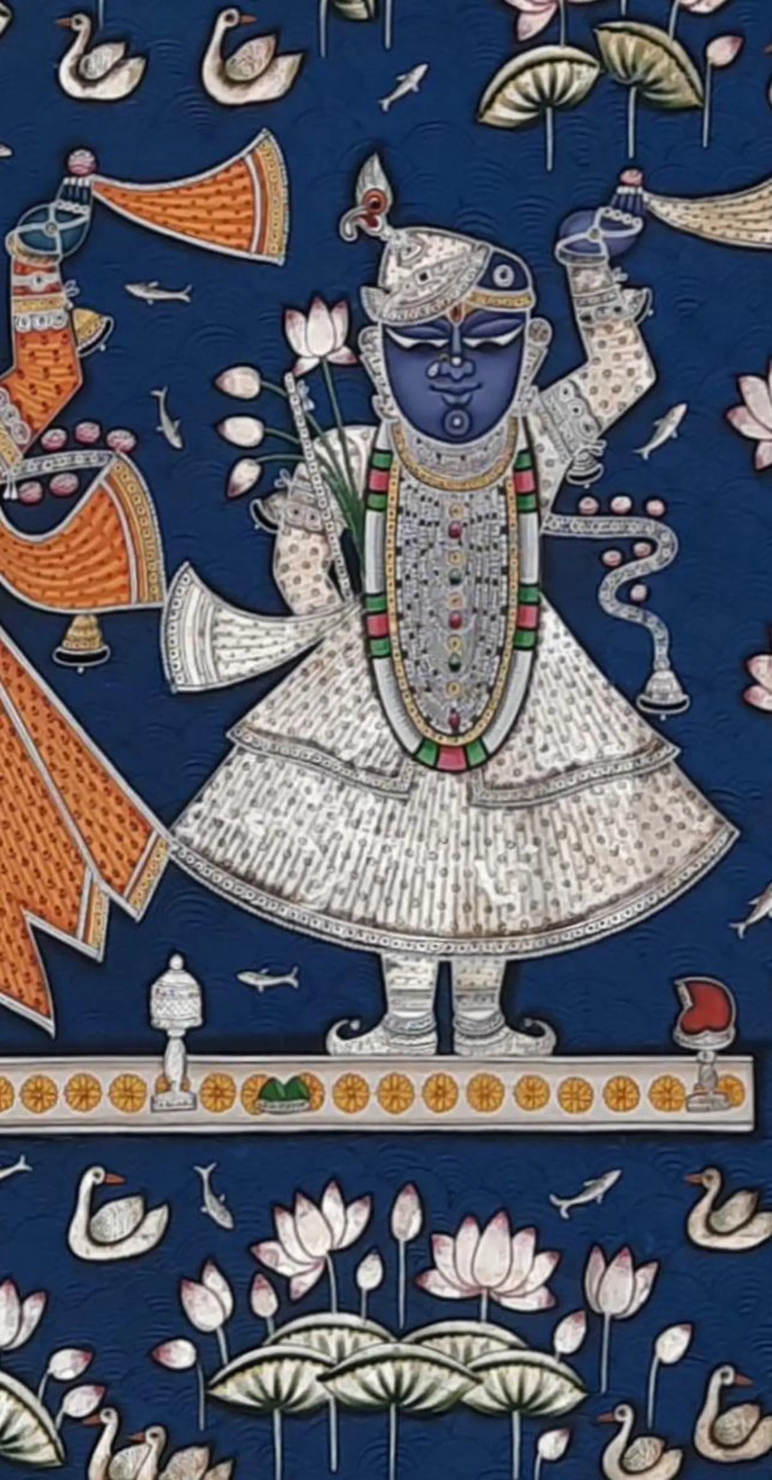 Vertical crop of Lord Shrinathji Pichwai painting highlighting central deity, decorative borders, and devotional symbolism