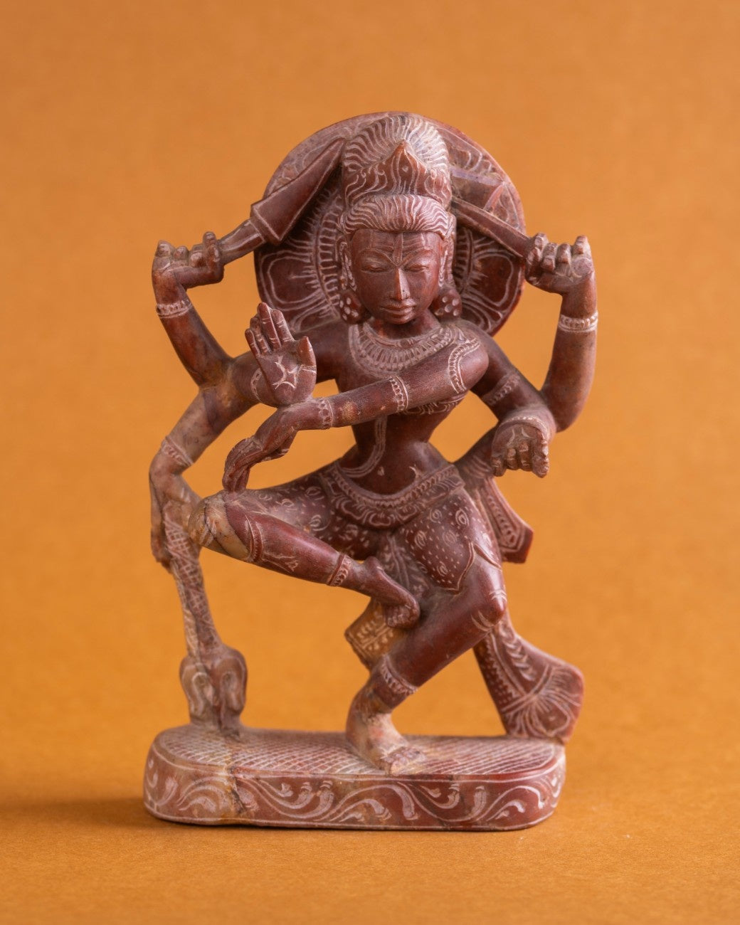 Hand-carved Indian red stone Lord Shiva sculpture in dynamic dance form
