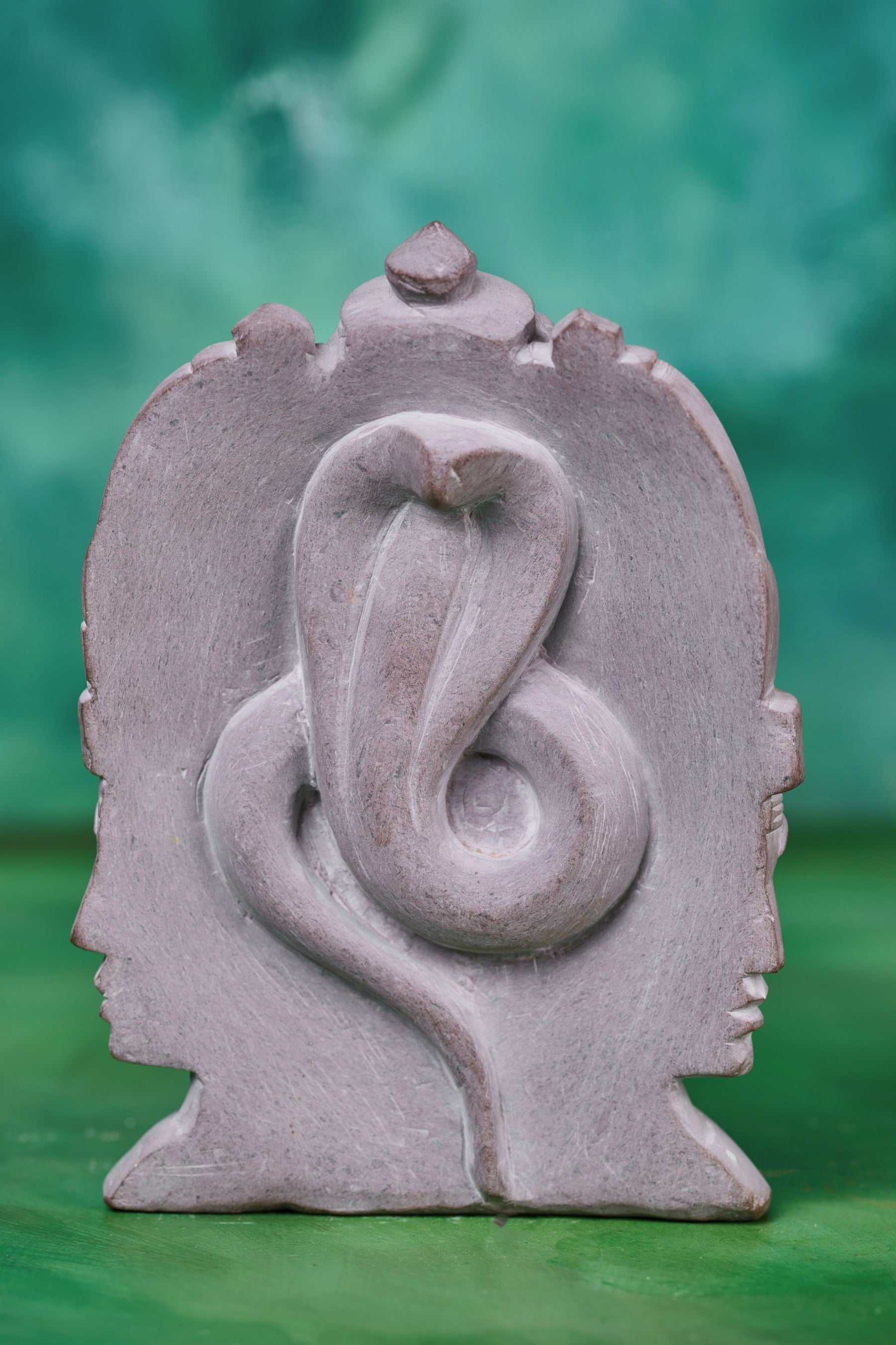 Sacred Shiva trinity stone artwork reflecting timeless Hindu symbolism and meditative serenity