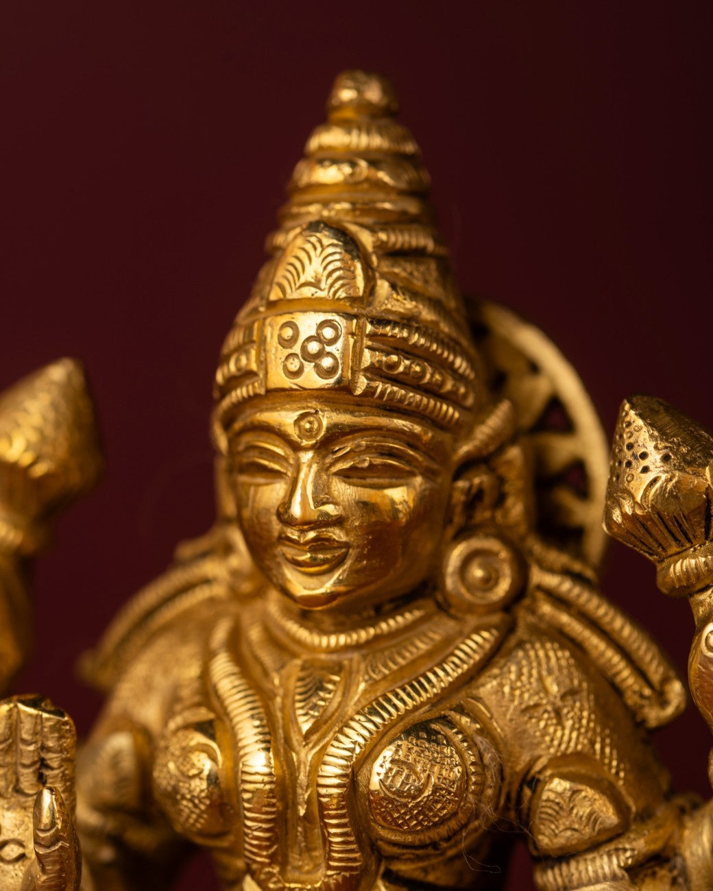 Front view of the hand-crafted brass sculpture of Goddess Lakshmi – premium Indian brass statue for home or altar.
