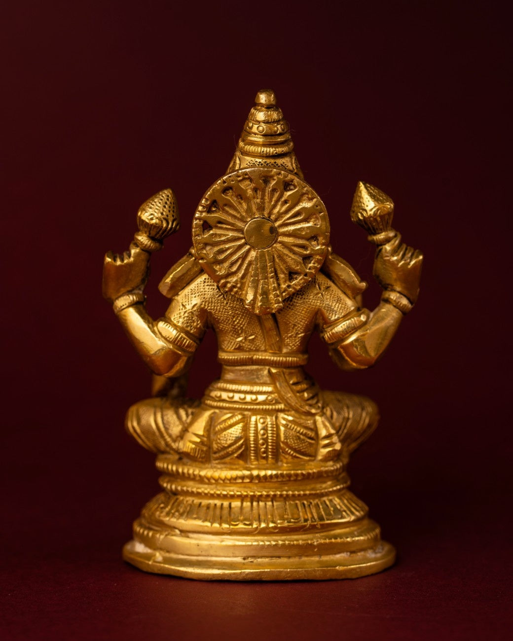 Back view of the Indian brass statue of Lakshmi – fine brass sculpture with detailed craftsmanship