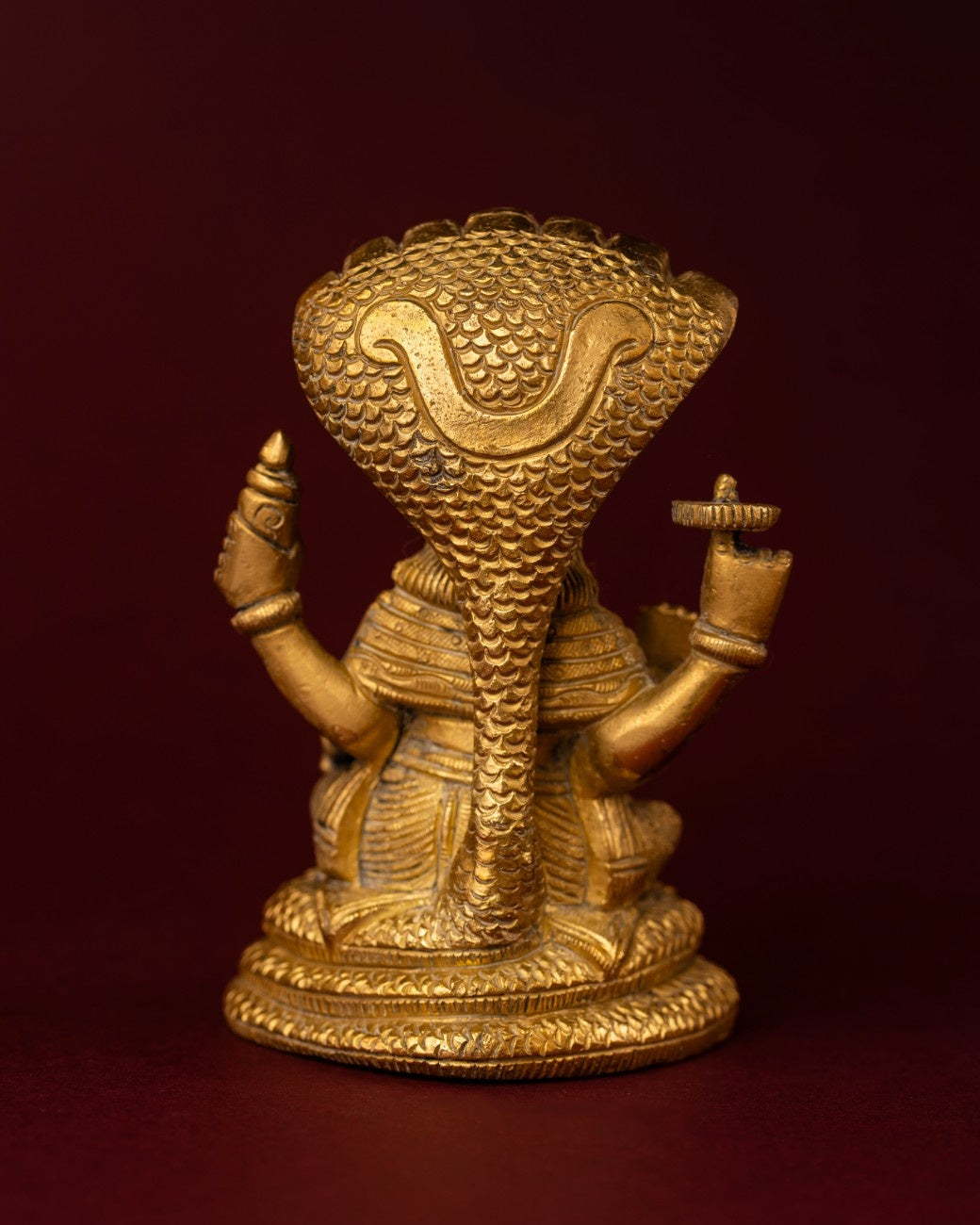 Rear view of brass Shiva sculpture showing Naga hood detailing