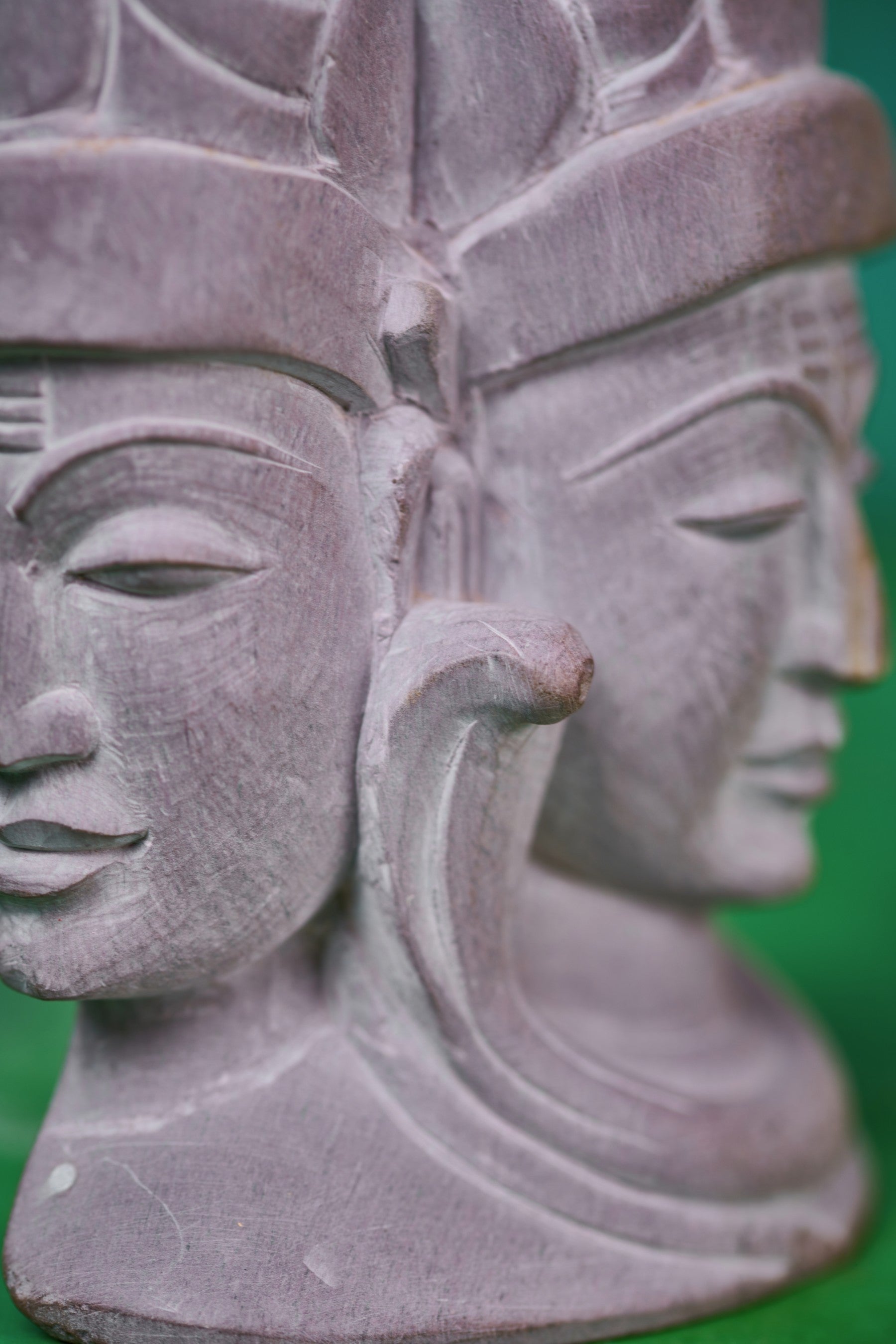 Hand carved stone Shiva trinity sculpture highlighting skilled craftsmanship and deep spiritual significance