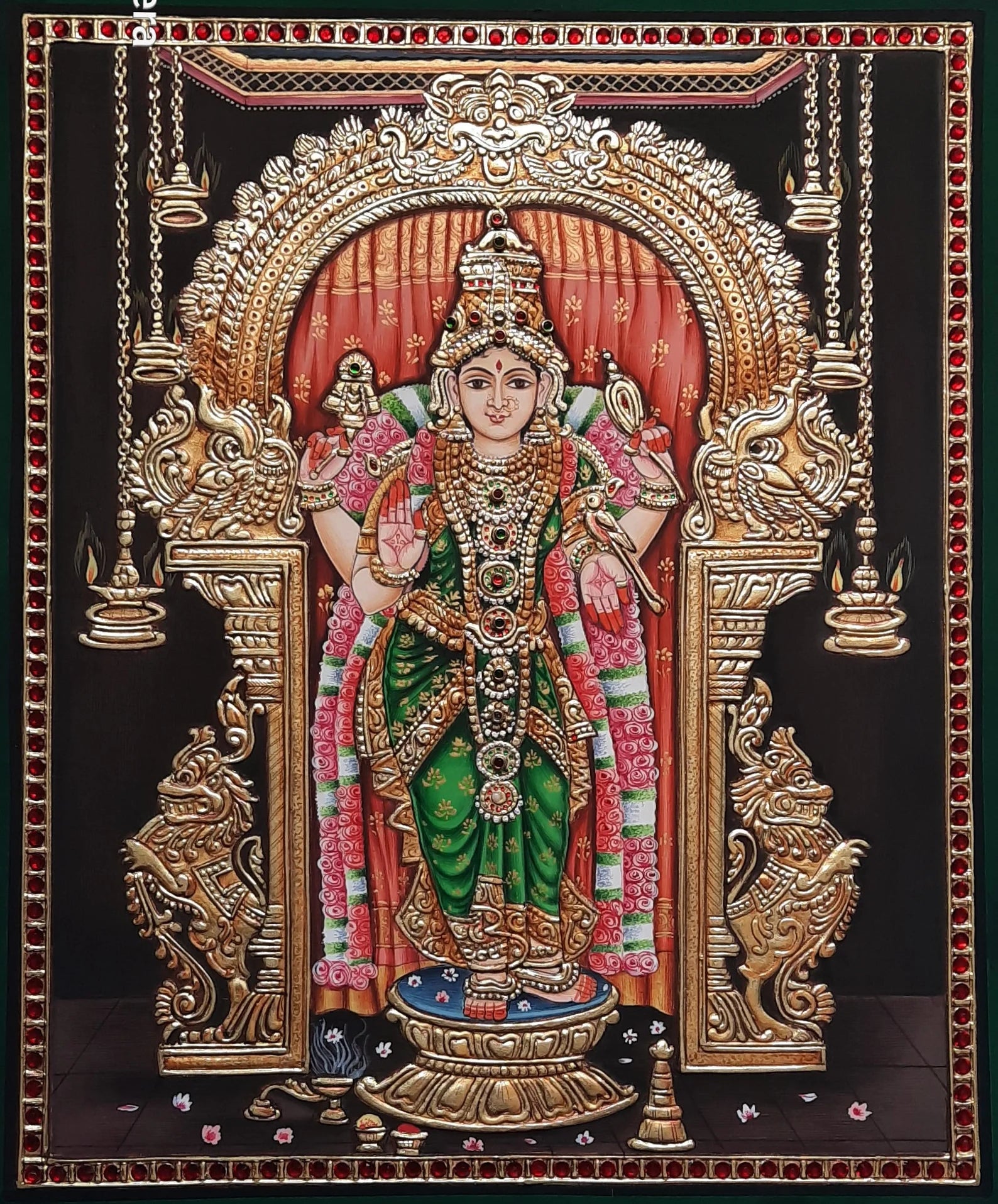 Traditional Tanjore painting panel depicting Goddess Meenakshi with gold leaf detailing and sacred ornamentation