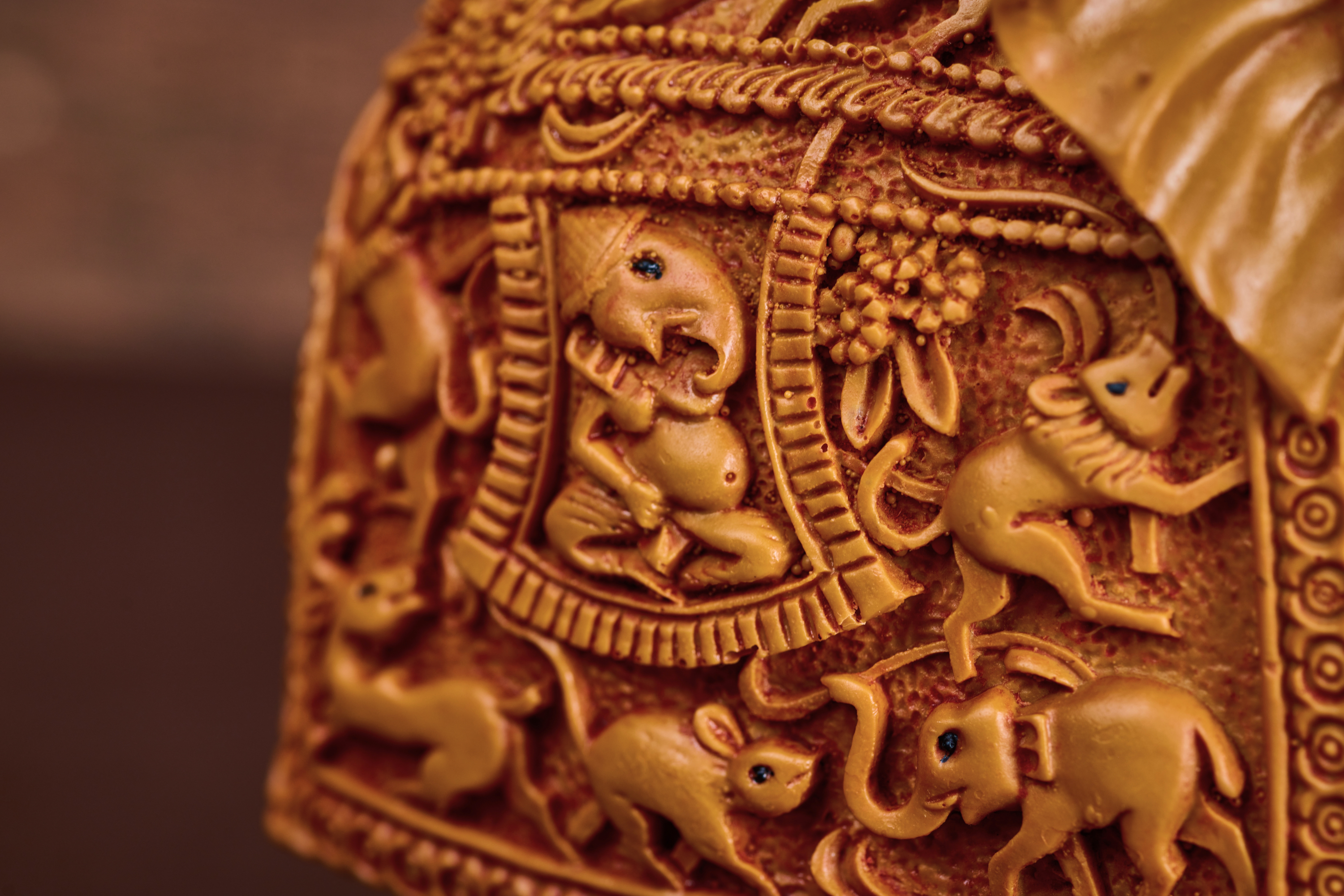 Traditional wooden elephant sculpture reflecting artisanal carving and symbolic cultural significance