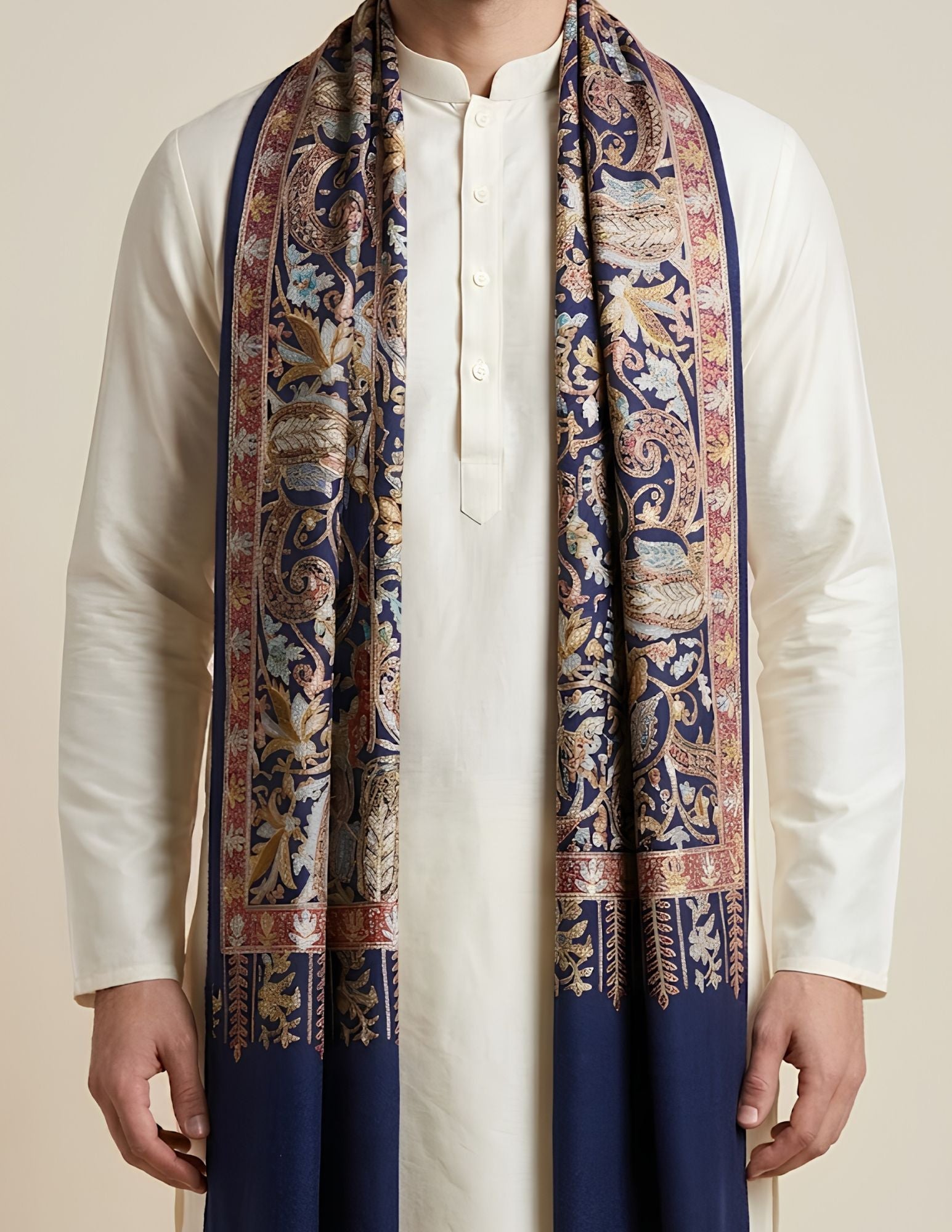 Navy Jamawar stole worn over one shoulder.