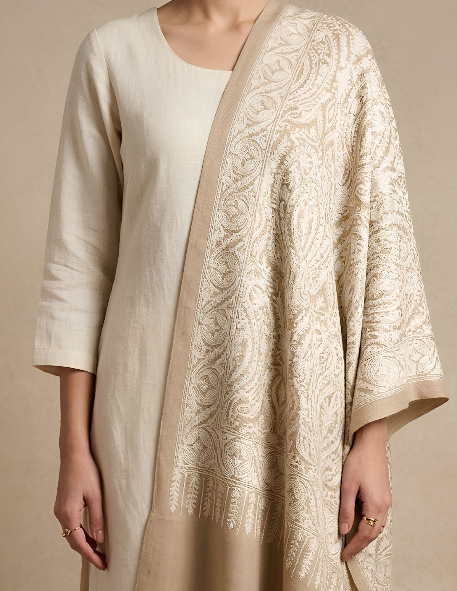 Ivory wool silk Sozni Kashmiri stole with tone-on-tone paisley and floral embroidery.