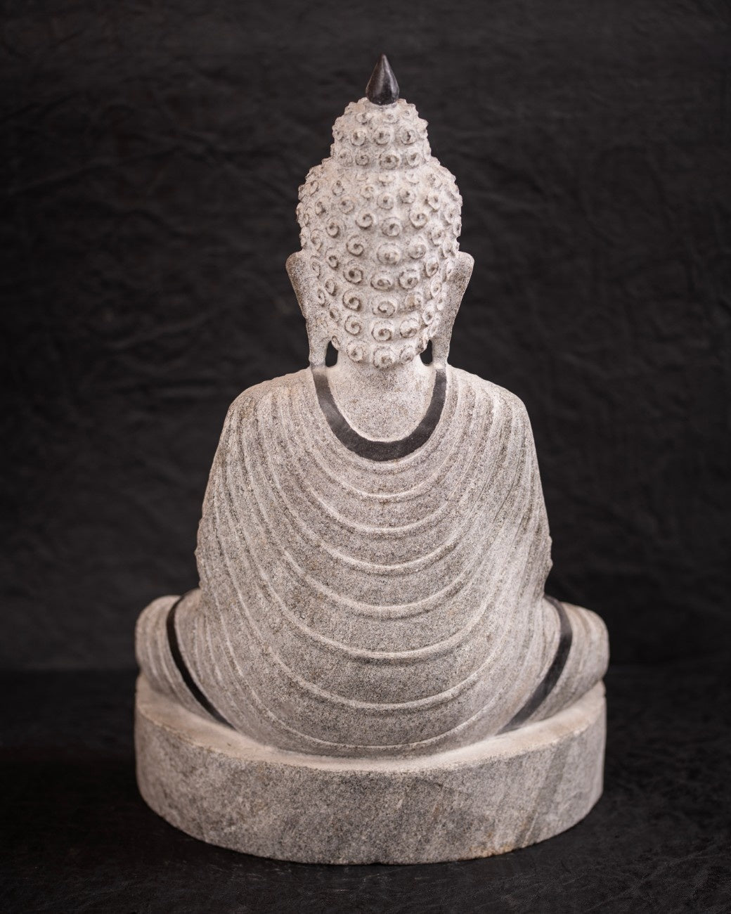 Meditating Buddha Statue in the Lotus Pose