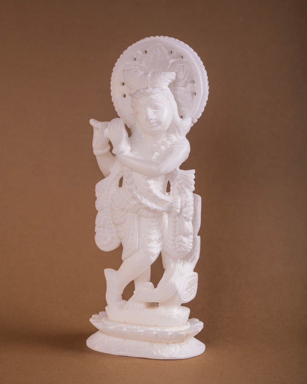 Krishna statue white marble hand-carved idol styled for home décor altar sacred Indian art.