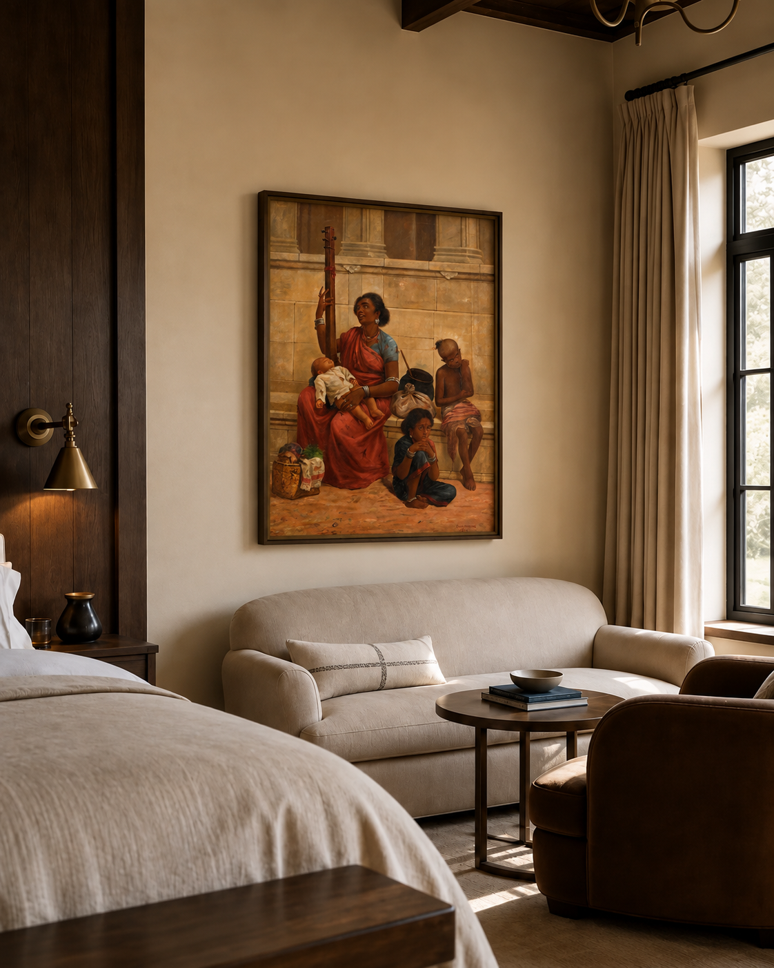 The framed print on a bedroom wall above a cream sofa and round side table by a window