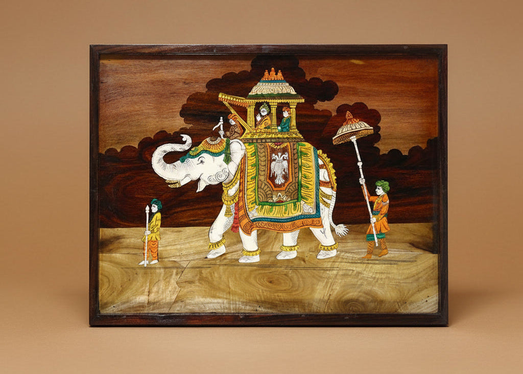 Full view of handcrafted Mysore rosewood inlay artwork depicting a ceremonial Ambari procession with a richly adorned elephant carrying royal insignia, framed in dark rosewood, created using traditional inlay techniques from Karnataka.