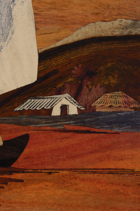 Close-up of Mysore rosewood inlay detailing showing handcrafted boat scene and natural wood grain
