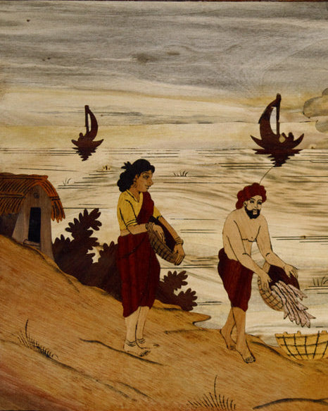 Close-up detail of handcrafted Mysore rosewood inlay showing fishing figures, fine carving, and natural wood contrasts.