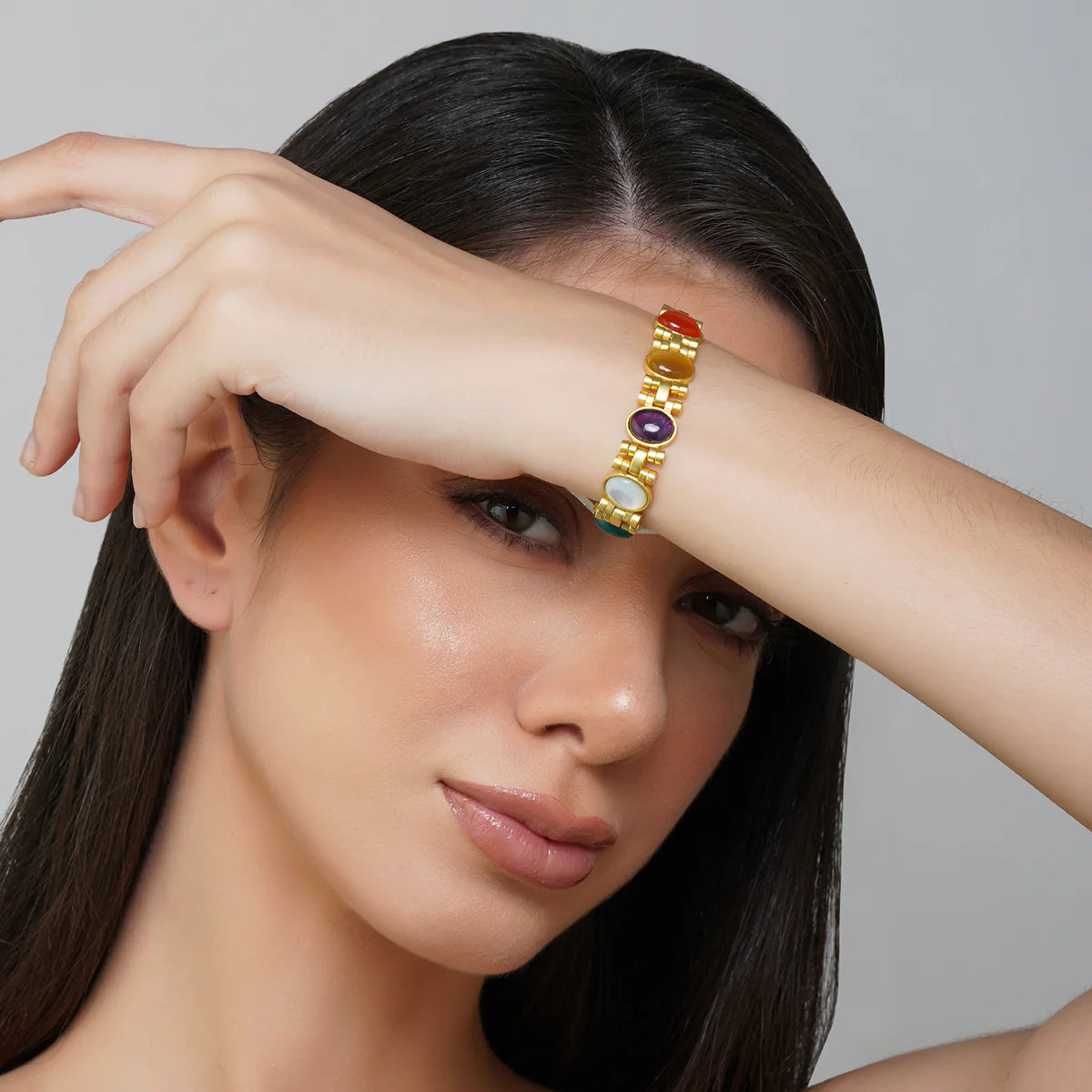 Gold Navratna bracelet worn by model for everyday styling
