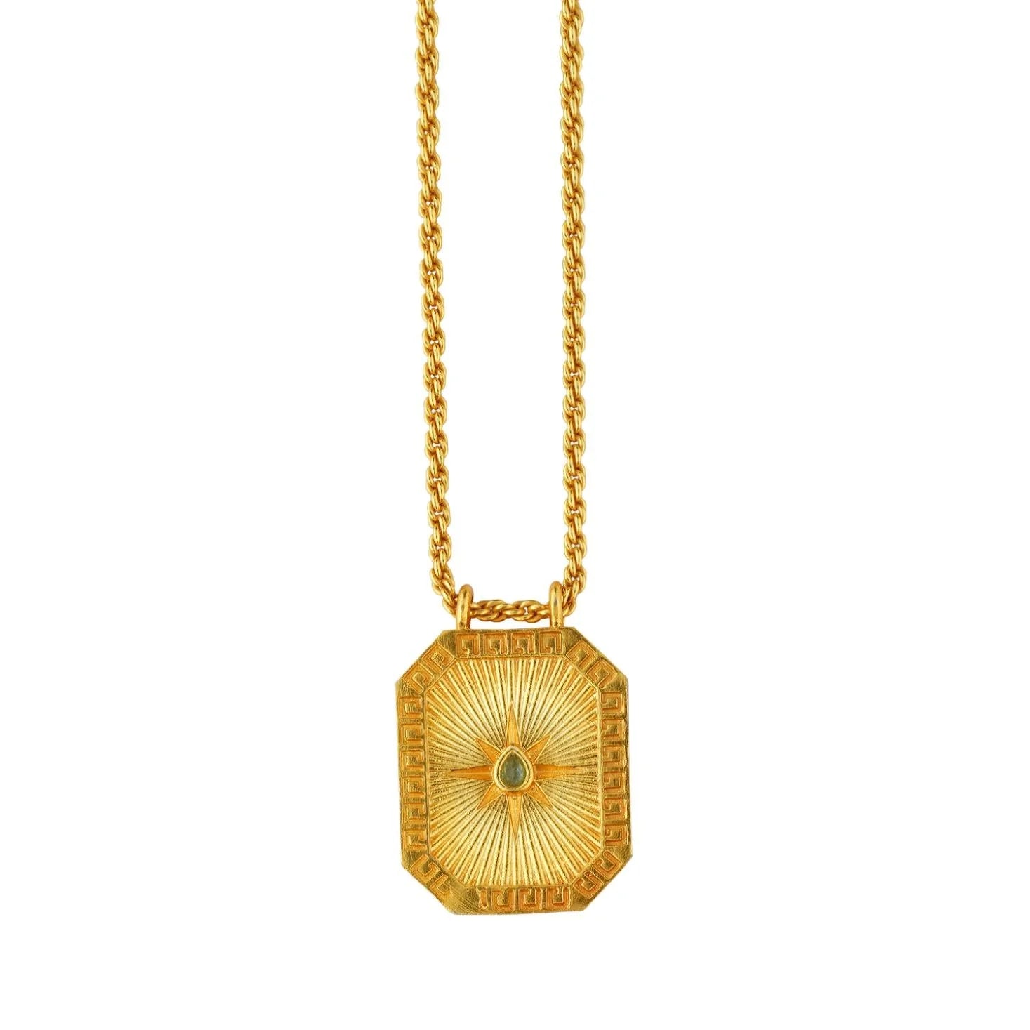 Gold reversible Sagittarius tablet pendant with blue topaz crystal back on chain