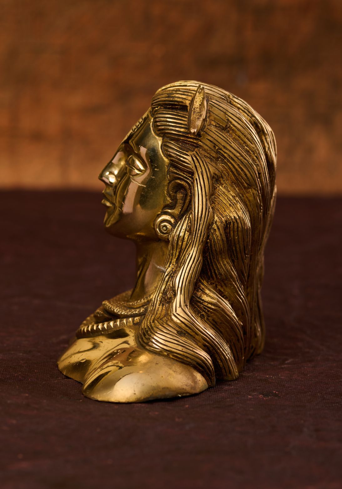 Side view of brass bust of Adiyogi Shiva – Indian brass statue