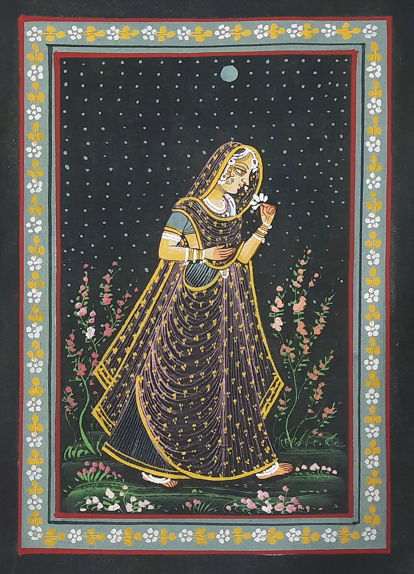 Ragamala painting showing a solitary woman in green attire expressing a musical raga mood