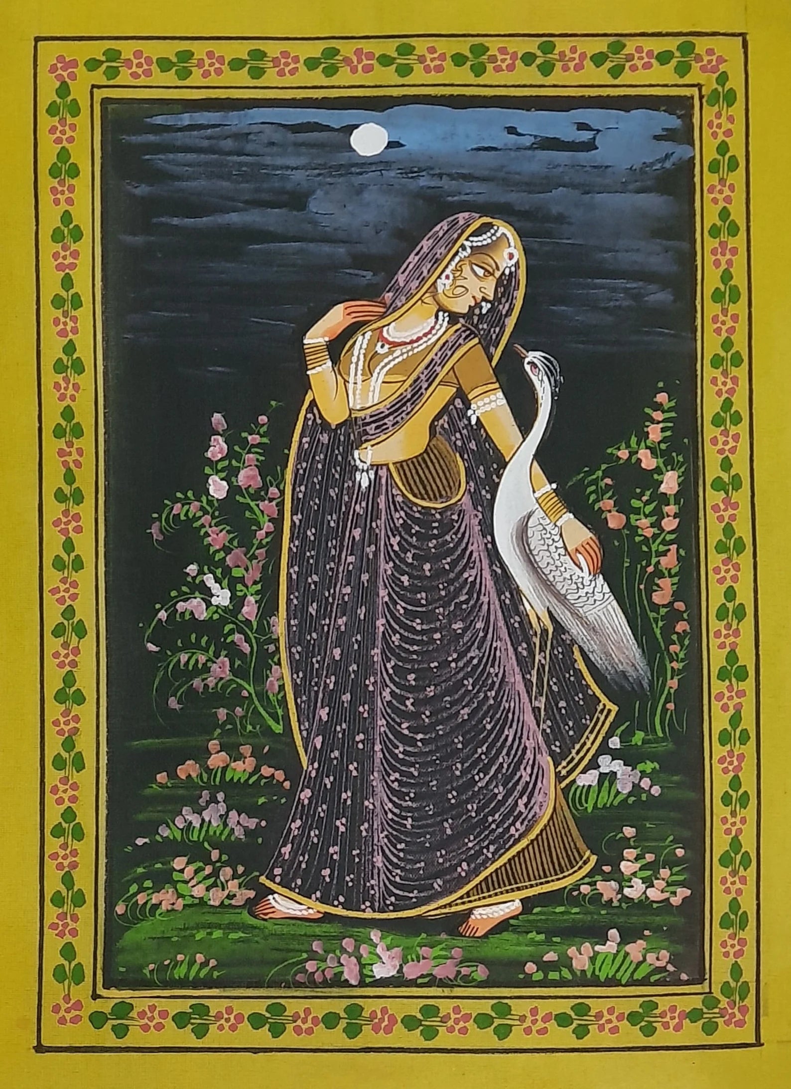 Antique Ragamala painting depicting a woman with a deer representing harmony and melody