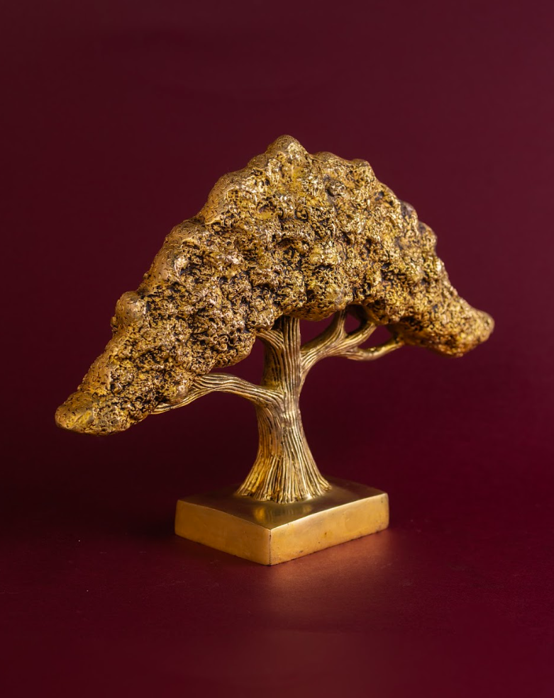 Front angled view of brass Banyan Tree sculpture highlighting dense foliage and trunk form